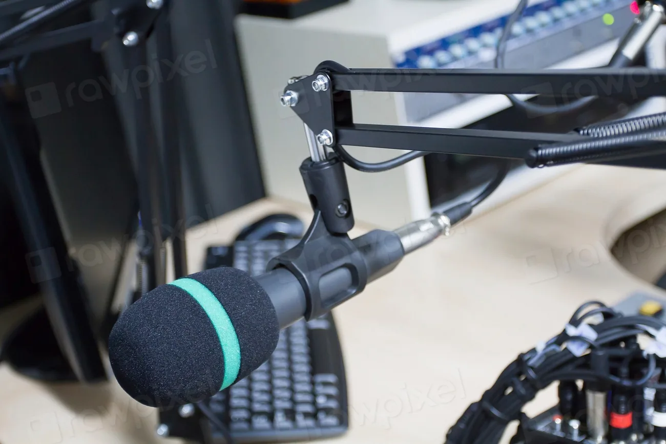 Broadcast studio microphone and mixing desk